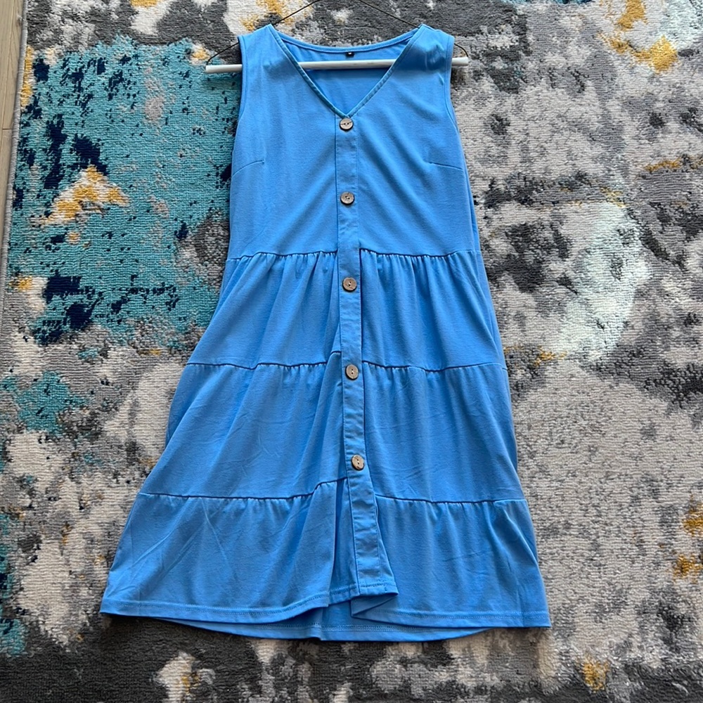 Carnation blue/baby blue flows mid-length dress. Pockets. Used once.
